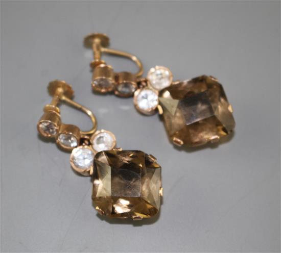 A pair of 9ct, smoky quartz and white paste set drop ear clips, drop 37mm, gross weight 13.5 grams.